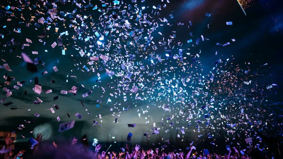 Crowd celebrating at a live event